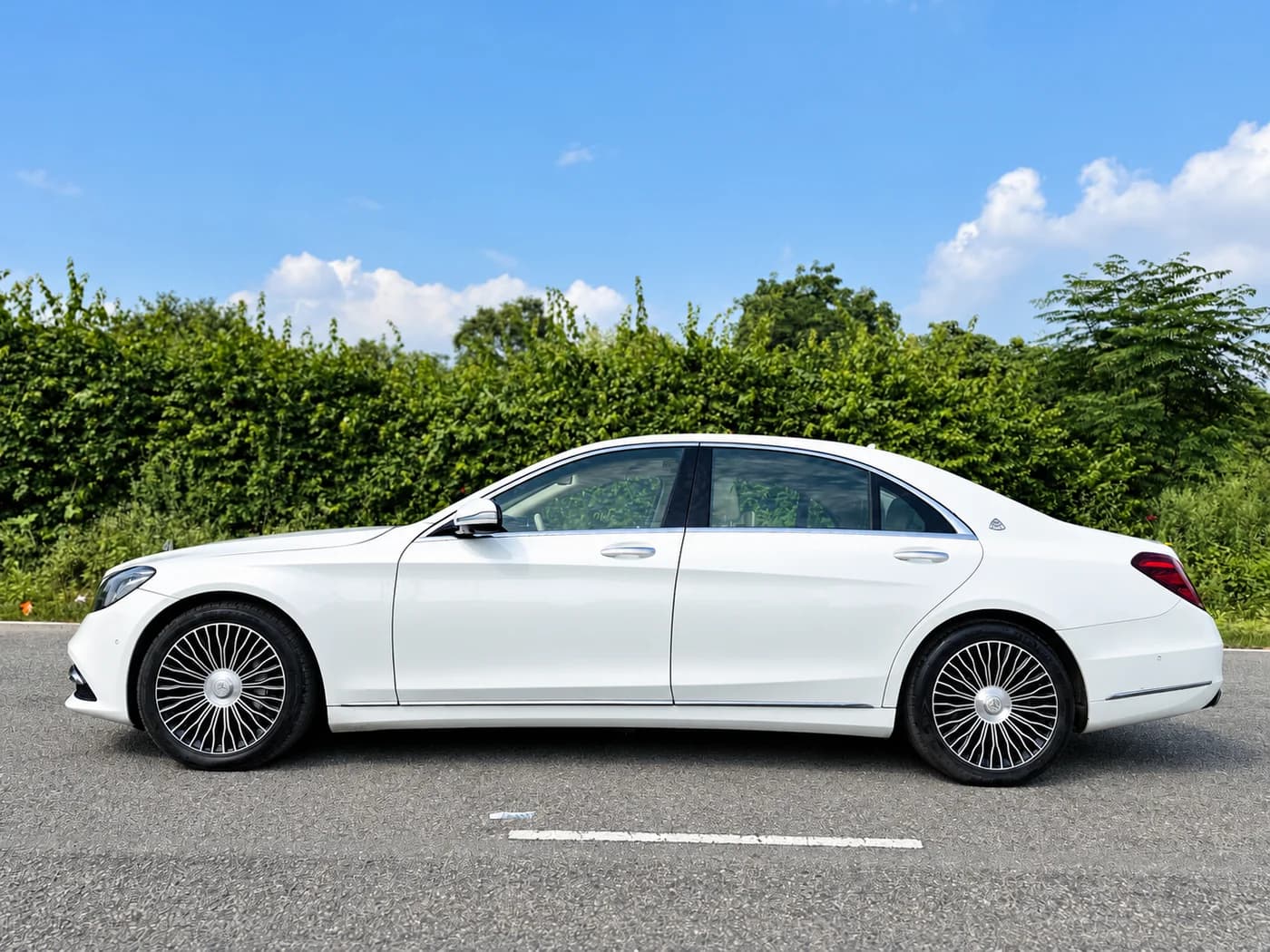 White Mercedes-Maybach S580 side exterior